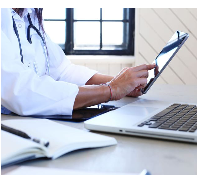 Photo of prescriber using a tablet